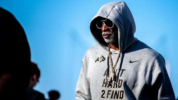 CU football head coach Deion Sanders, or Coach Prime, watches his team warm up before the game against CSU in the Rocky Mountain Showdown at Canvas Stadium on Saturday, Sept. 14, 2024, in Fort Collins, Colo.