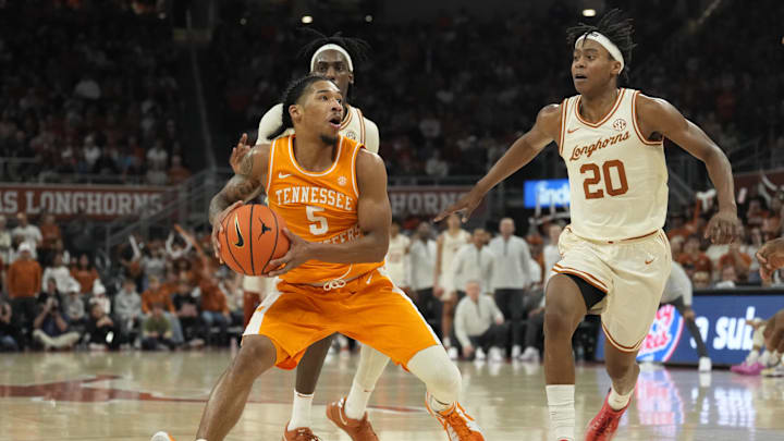 Jan 11, 2025; Austin, Texas, USA; Tennessee Volunteers guard Zakai Zeigler (5) drives to the basket against Texas Longhorns guard Tre Johnson (20) during the second half at Moody Center. Mandatory Credit: Scott Wachter-Imagn Images Jan 11, 2025; Austin, Texas, USA; Tennessee Volunteers guard Zakai Zeigler (5) drives to the basket against Texas Longhorns guard Tre Johnson (20) during the second half at Moody Center. Mandatory Credit: Scott Wachter-Imagn Images