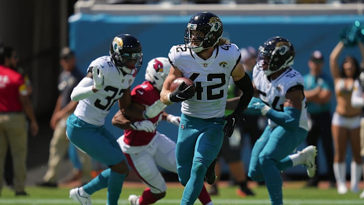 Sep 26, 2021; Jacksonville, Florida, USA; Jacksonville Jaguars defensive back Andrew Wingard (42) runs the ball after intercepting a pass from Arizona Cardinals quarterback Kyler Murray (not pictured) during the second half at TIAA Bank Field. Mandatory Credit: Jasen Vinlove-Imagn Images