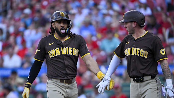 Jul 24, 2025; St. Louis, Missouri, USA; San Diego Padres right fielder Fernando Tatis Jr. (23) is congratulated by center fielder Jackson Merrill (3) after scoring against the St. Louis Cardinals during the first inning at Busch Stadium. Mandatory Credit: Jeff Curry-Imagn Images Jul 24, 2025; St. Louis, Missouri, USA; San Diego Padres right fielder Fernando Tatis Jr. (23) is congratulated by center fielder Jackson Merrill (3) after scoring against the St. Louis Cardinals during the first inning at Busch Stadium. Mandatory Credit: Jeff Curry-Imagn Images