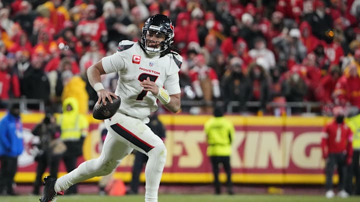 Jan 18, 2025; Kansas City, Missouri, USA; Houston Texans quarterback C.J. Stroud (7) rolls out to throw against the Kansas City Chiefs during the fourth quarter of a 2025 AFC divisional round game at GEHA Field at Arrowhead Stadium. Mandatory Credit: Denny Medley-Imagn Images