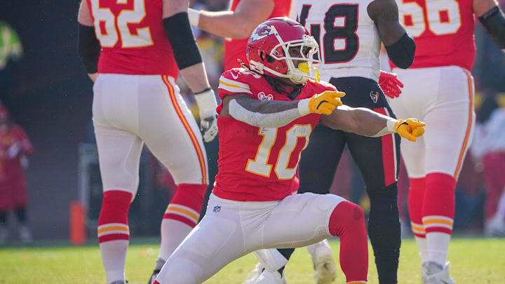 Dec 21, 2024; Kansas City, Missouri, USA; Kansas City Chiefs running back Isiah Pacheco (10) celebrates after a play against the Houston Texans during the first half at GEHA Field at Arrowhead Stadium. Mandatory Credit: Denny Medley-Imagn Images