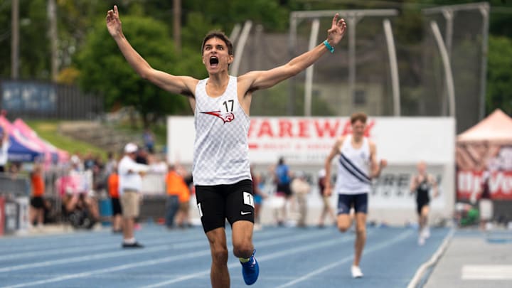 Western Dubuque's Quentin Nauman reacts as he crosses the finish line in the 3A 1600 meter final during the 2025 Iowa high school state track and field meet at Drake Stadium on May 24, 2025, in Des Moines.