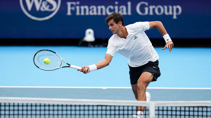 Aug 19, 2026; Mason, OH, USA;  Rafael Jodar (ESP) returning a shot against Flavio Cobolli (ITA) during the Cincinnati Open at Lindner Family Tennis Center. Mandatory Credit: Aaron Doster-Imagn Images