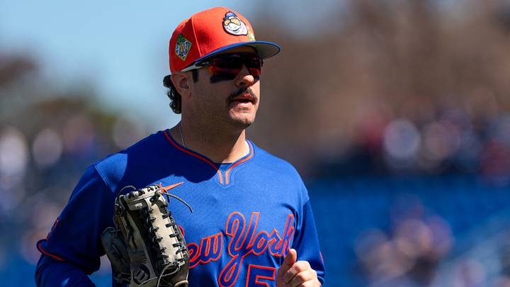 Feb 24, 2026; Port St. Lucie, Florida, USA; New York Mets right fielder Mike Tauchman (50) returns to the dugout against the Houston Astros during the first inning at Clover Park. Mandatory Credit: Sam Navarro-Imagn Images