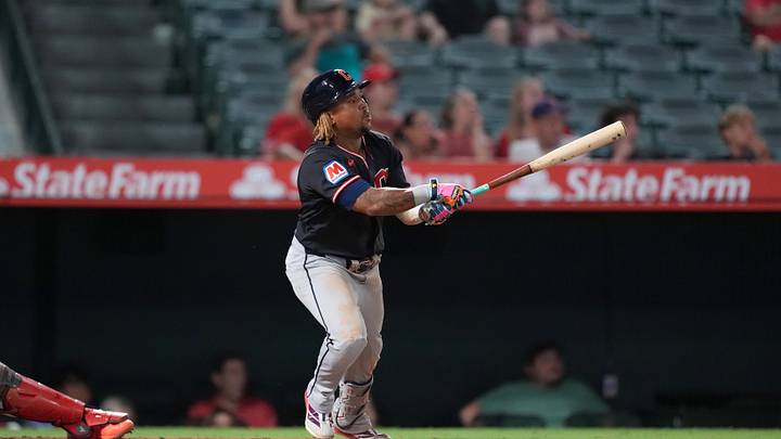 Aug 25, 2026; Anaheim, California, USA; Cleveland Guardians third baseman Jose Ramírez (11) hits a two RBI double in the 10th inning against the Los Angeles Angels at Angel Stadium. Mandatory Credit: Kirby Lee-Imagn Images