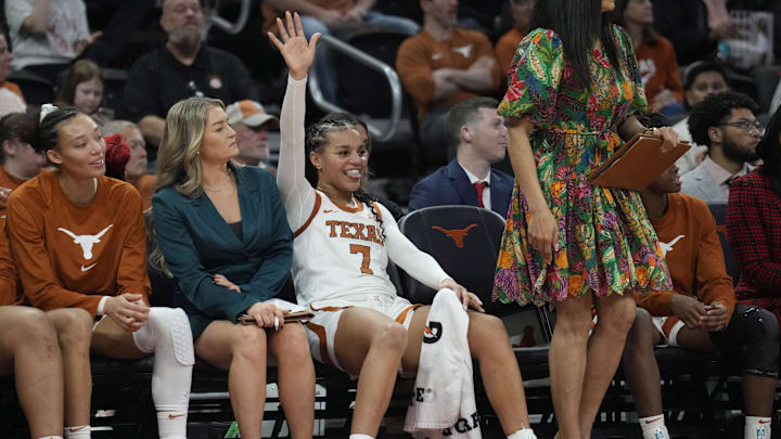 Dec 22, 2024; Austin, Texas, USA; Texas Longhorns guard Jordan Lee (7) reacts on the bench during the second half against the South Dakota State Jackrabbits at Moody Center. Mandatory Credit: Scott Wachter-Imagn Images