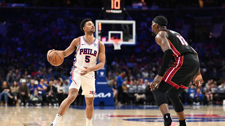 Mar 29, 2025; Philadelphia, Pennsylvania, USA; Philadelphia 76ers guard Quentin Grimes (5) controls the ball against the Miami Heat in the third quarter at Wells Fargo Center. Mandatory Credit: Kyle Ross-Imagn Images