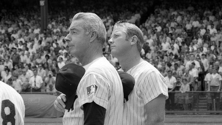 August 8, 1970; New York, NY, USA; Yankees Old Timers Joe DiMaggio and Mickey Mantle pause for the national anthem at the start of the annual Old-Timers' Day game at Yankee Stadium in New York City on August 8, 1970. Mandatory Credit: Stuart Davis-USA TODAY NETWORK