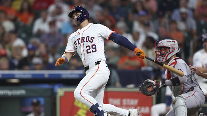Aug 12, 2025; Houston, Texas, USA; Houston Astros second baseman Ramon Urias (29) hits a single during the second inning against the Boston Red Sox at Daikin Park. Mandatory Credit: Troy Taormina-Imagn Images Aug 12, 2025; Houston, Texas, USA; Houston Astros second baseman Ramon Urias (29) hits a single during the second inning against the Boston Red Sox at Daikin Park. Mandatory Credit: Troy Taormina-Imagn Images