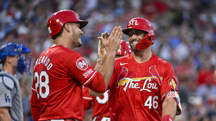 St. Louis Cardinals first baseman Paul Goldschmidt celebrates with third baseman Nolan Arenado after hitting a two-run home run against the Los Angeles Dodgers at Busch Stadium on August 16, 2024. 