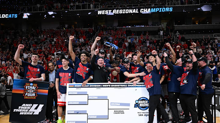 Mar 28, 2026; San Jose, CA, USA; The Arizona Wildcats celebrates with the West Regional Championship trophy after an Elite Eight game against the Purdue Boilermakers of the West Regional of the men's 2026 NCAA Tournament at SAP Center. Mandatory Credit: Eakin Howard-Imagn Images