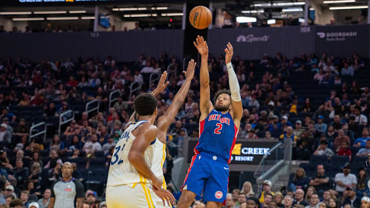 Oct 13, 2024; San Francisco, California, USA;  Detroit Pistons guard Cade Cunningham (2) shoots the basketball against Golden State Warriors guard Moses Moody (4) during the second quarter at Chase Center. Mandatory Credit: Neville E. Guard-Imagn Images