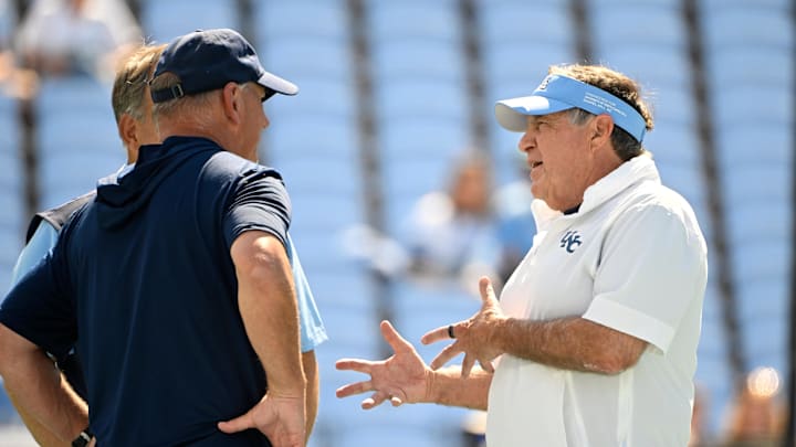 Sep 13, 2025; Chapel Hill, North Carolina, USA; North Carolina Tar Heels head coach Bill Belichick with Richmond Spiders head coach Russ Huesman before the game at Kenan Stadium. Mandatory Credit: Bob Donnan-Imagn Images Sep 13, 2025; Chapel Hill, North Carolina, USA; North Carolina Tar Heels head coach Bill Belichick with Richmond Spiders head coach Russ Huesman before the game at Kenan Stadium. Mandatory Credit: Bob Donnan-Imagn Images