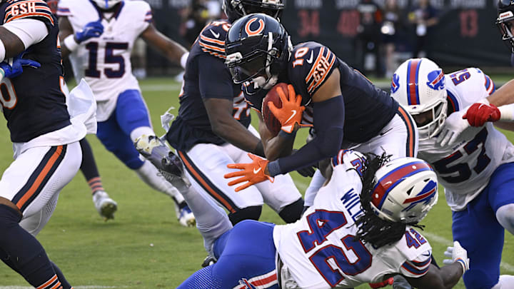 Bears wide receiver Tyler Scott (10) runs against Buffalo Bills linebacker Dorian Williams (42) in the preseason Bears wide receiver Tyler Scott (10) runs against Buffalo Bills linebacker Dorian Williams (42) in the preseason