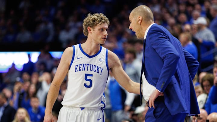 Dec 2, 2025; Lexington, Kentucky, USA; Kentucky Wildcats guard Jaland Lowe (15) talks with head coach Mark Pope during the second half at Rupp Arena at Central Bank Center. Mandatory Credit: Jordan Prather-Imagn Images Dec 2, 2025; Lexington, Kentucky, USA; Kentucky Wildcats guard Jaland Lowe (15) talks with head coach Mark Pope during the second half at Rupp Arena at Central Bank Center. Mandatory Credit: Jordan Prather-Imagn Images
