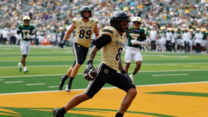 Sep 26, 2026; Waco, Texas, USA;  Colorado Buffaloes wide receiver Joseph Williams (8) scores a touchdown against the Baylor Bears during the second half at McLane Stadium.  Mandatory Credit: Chris Jones-Imagn Images