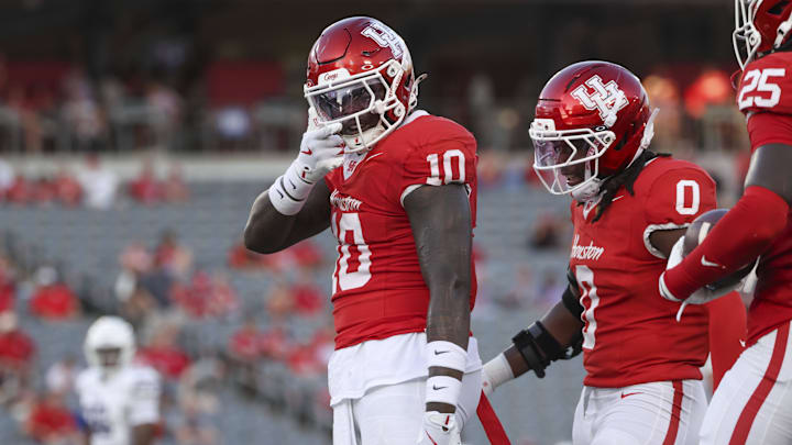 Aug 28, 2025; Houston, Texas, USA; Houston Cougars linebacker Latreveon McCutchin (10) reacts after a play during the first quarter against the Stephen F. Austin Lumberjacks at TDECU Stadium. Mandatory Credit: Troy Taormina-Imagn Images