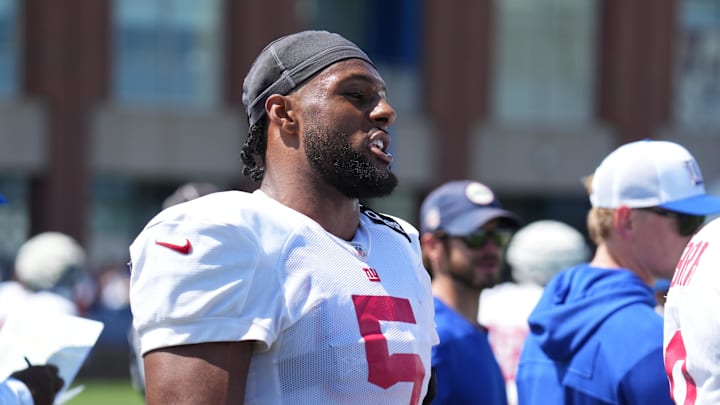 Jul 26, 2024; East Rutherford, NJ, USA; New York Giants linebacker Kayvon Thibodeaux (5) speaks on the sideline during training camp at Quest Diagnostics Training Center. Mandatory Credit: Lucas Boland-USA TODAY Sports