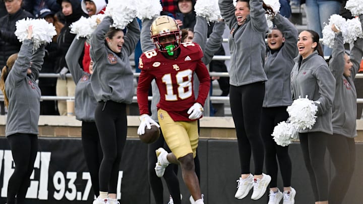 Nov 23, 2024; Chestnut Hill, Massachusetts, USA; Boston College Eagles cornerback Ryan Turner (18) scores a touchdown off his interception during the second half against the North Carolina Tar Heels at Alumni Stadium. Mandatory Credit: Eric Canha-Imagn Images Nov 23, 2024; Chestnut Hill, Massachusetts, USA; Boston College Eagles cornerback Ryan Turner (18) scores a touchdown off his interception during the second half against the North Carolina Tar Heels at Alumni Stadium. Mandatory Credit: Eric Canha-Imagn Images
