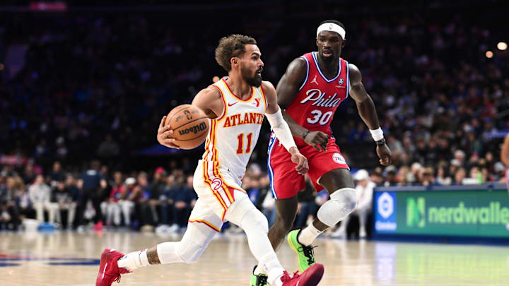 Apr 11, 2025; Philadelphia, Pennsylvania, USA; Atlanta Hawks guard Trae Young (11) drives with the ball against the Philadelphia 76ers in the second quarter at Wells Fargo Center. Mandatory Credit: Kyle Ross-Imagn Images