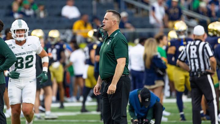 Sep 19, 2026; South Bend, Indiana, USA; Michigan State Spartans head coach Pat Fitzgerald watches during warmups before facing the Notre Dame Fighting Irish at Notre Dame Stadium. Mandatory Credit: Michael Caterina-Imagn Images Sep 19, 2026; South Bend, Indiana, USA; Michigan State Spartans head coach Pat Fitzgerald watches during warmups before facing the Notre Dame Fighting Irish at Notre Dame Stadium. Mandatory Credit: Michael Caterina-Imagn Images