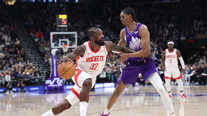 Feb 22, 2025; Salt Lake City, Utah, USA;Houston Rockets forward Jeff Green (32) drives against Utah Jazz forward Cody Williams (5) during the second half at Delta Center. Mandatory Credit: Rob Gray-Imagn Images