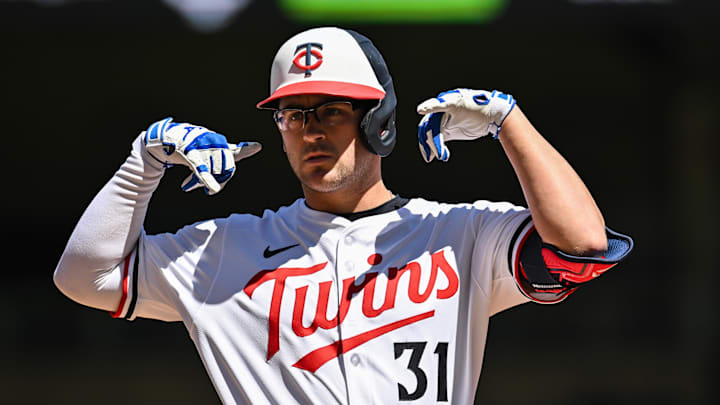 Apr 26, 2025; Minneapolis, Minnesota, USA; Minnesota Twins first base Jonah Bride (31) reacts after hitting an RBI single to score shortstop Carlos Correa (not pictured) during the first inning off Los Angeles Angels pitcher Yusei Kikuchi (not pictured) at Target Field. Mandatory Credit: Jeffrey Becker-Imagn Images