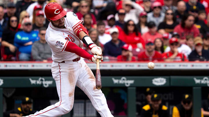 Cincinnati Reds catcher Austin Wynns (38) hits a base hit in the fifth inning of the MLB game between the Cincinnati Reds and the Pittsburgh Pirates at Great American Ball Park in Cincinnati on Sunday, April 13, 2025.