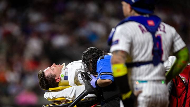 Sep 17, 2026; New York City, New York, USA;  New York Mets first baseman Jared Young (29) receives medical attention after an injury at first base during the sixth inning against the Philadelphia Phillies at Citi Field.  Mandatory Credit: John Jones-Imagn Images