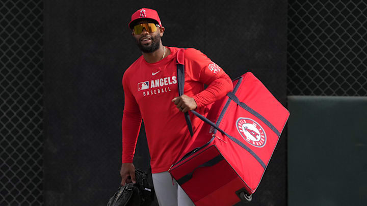 Feb 16, 2025; Tempe, AZ, USA; Los Angeles Angels catcher Chuckie Robinson (33) works out in the bullpen during spring training camp. Mandatory Credit: Rick Scuteri-Imagn Images