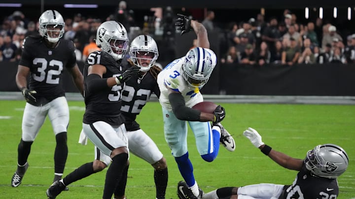 Nov 17, 2025; Paradise, Nevada, USA; Dallas Cowboys wide receiver George Pickens (3) escapes the tackle attempt by Las Vegas Raiders cornerback Darnay Holmes (30) during the second half at Allegiant Stadium. Mandatory Credit: Kirby Lee-Imagn Images