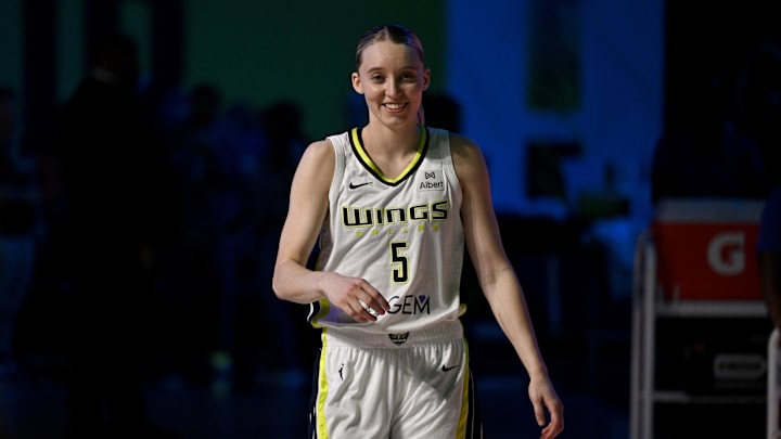 Dallas Wings guard Paige Bueckers walks off the court after the game against the New York Liberty.