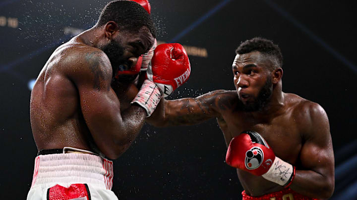Carlos Adames lands a right hand on Terrell Gausha.