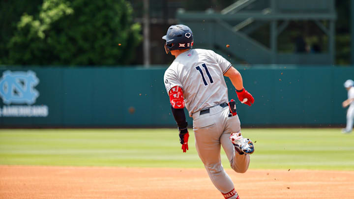 Jun 8, 2025; Chapel Hill, NC, USA;  Arizona outfielder Aaron Walton (11) runs the bases during the first inning of the Super Regionals game against North Carolina in Chapel Hill, North Carolina. Mandatory Credit: Jaylynn Nash-Imagn Images