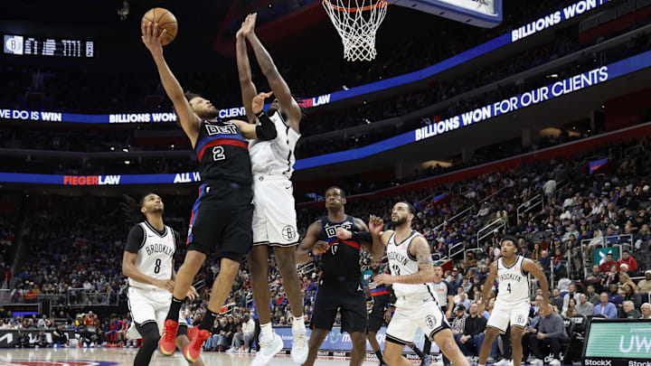 Mar 1, 2025; Detroit, Michigan, USA; Detroit Pistons guard Cade Cunningham (2) shoots on Brooklyn Nets center Day'Ron Sharpe (20) in the second half at Little Caesars Arena. Mandatory Credit: Rick Osentoski-Imagn Images Mar 1, 2025; Detroit, Michigan, USA; Detroit Pistons guard Cade Cunningham (2) shoots on Brooklyn Nets center Day'Ron Sharpe (20) in the second half at Little Caesars Arena. Mandatory Credit: Rick Osentoski-Imagn Images