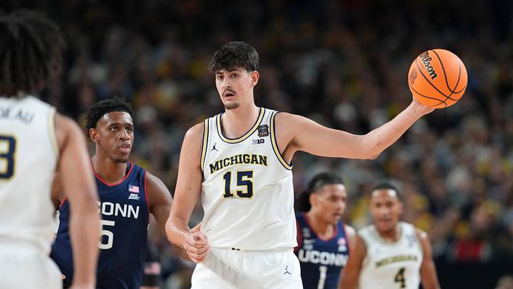Michigan Wolverines center Aday Mara controls the ball. Michigan Wolverines center Aday Mara controls the ball.