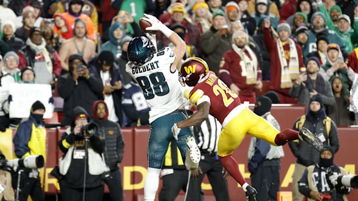 Dec 20, 2025; Landover, Maryland, USA; Philadelphia Eagles tight end Dallas Goedert (88) makes a catch for a touchdown against Washington Commanders safety Quan Martin (20) during the second half at Northwest Stadium. 