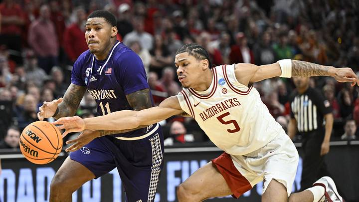 Mar 21, 2026; Portland, OR, USA; Arkansas Razorbacks guard Darius Acuff Jr. (5) defends High Point Panthers forward Cam'ron Fletcher (11) in the second half during a second round game of the men's 2026 NCAA Tournament at Moda Center. Mandatory Credit: Craig Strobeck-Imagn Images Mar 21, 2026; Portland, OR, USA; Arkansas Razorbacks guard Darius Acuff Jr. (5) defends High Point Panthers forward Cam'ron Fletcher (11) in the second half during a second round game of the men's 2026 NCAA Tournament at Moda Center. Mandatory Credit: Craig Strobeck-Imagn Images