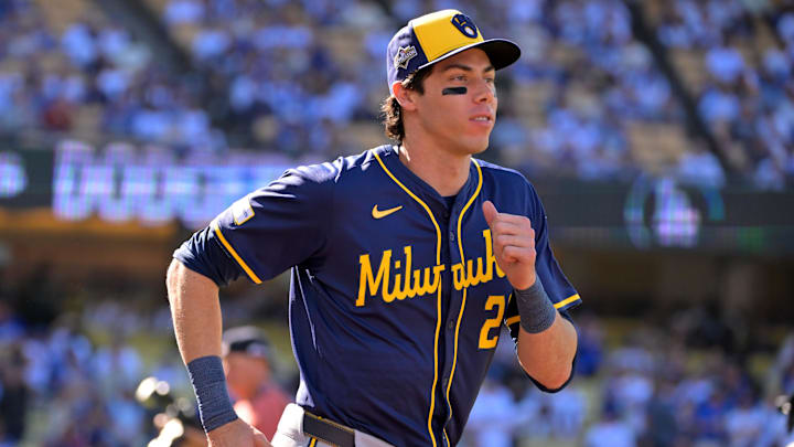 Oct 16, 2025; Los Angeles, California, USA; Milwaukee Brewers left fielder Christian Yelich (22) is introduced for game three of the NLCS during the 2025 MLB playoffs against the Los Angeles Dodgers at Dodger Stadium. Mandatory Credit: Jayne Kamin-Oncea-Imagn Images