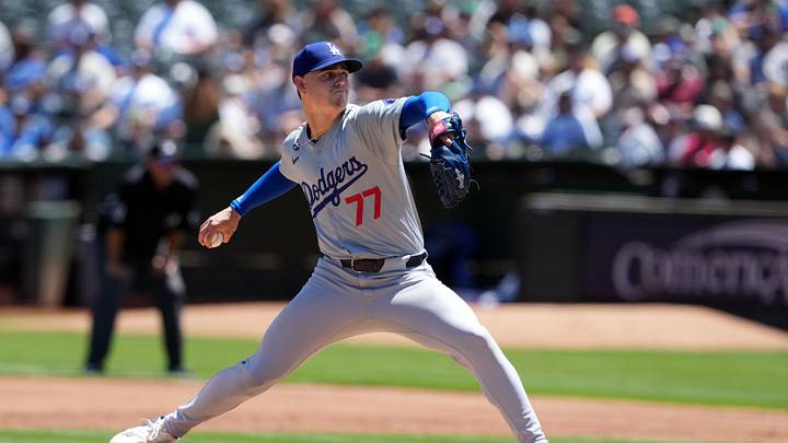 Aug 4, 2024; Oakland, California, USA; Los Angeles Dodgers starting pitcher River Ryan (77) throws a pitch against the Oakland Athletics during the first inning at Oakland-Alameda County Coliseum. Mandatory Credit: Darren Yamashita-Imagn Images Aug 4, 2024; Oakland, California, USA; Los Angeles Dodgers starting pitcher River Ryan (77) throws a pitch against the Oakland Athletics during the first inning at Oakland-Alameda County Coliseum. Mandatory Credit: Darren Yamashita-Imagn Images