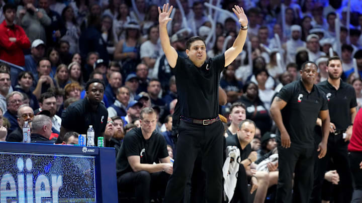 Cincinnati Bearcats head coach Wes Miller instructs the team in the second half of the 91st Crosstown Shootout basketball game between the Cincinnati Bearcats and the Xavier Musketeers, Saturday, Dec. 9, 2023, at Cintas Center in Cincinnati. The Xavier Musketeers won, 84-79. Cincinnati Bearcats head coach Wes Miller instructs the team in the second half of the 91st Crosstown Shootout basketball game between the Cincinnati Bearcats and the Xavier Musketeers, Saturday, Dec. 9, 2023, at Cintas Center in Cincinnati. The Xavier Musketeers won, 84-79.