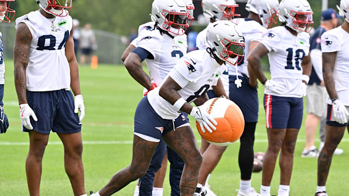 Jun 9, 2025; Foxborough, MA, USA; New England Patriots wide receiver Stefon Diggs (8) works with a training aid during minicamp at Gillette Stadium. Mandatory Credit: Eric Canha-Imagn Images