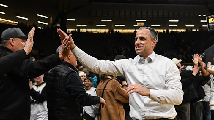 Jan 20, 2026; Iowa City, Iowa, USA; Iowa Hawkeyes head coach Ben McCollum reacts with fans after the game against the Rutgers Scarlet Knights at Carver-Hawkeye Arena. Mandatory Credit: Jeffrey Becker-Imagn Images