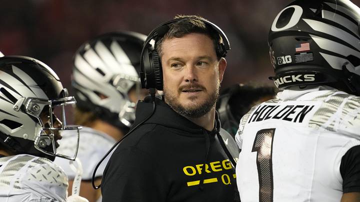 Nov 16, 2024; Madison, Wisconsin, USA;  Oregon Ducks head coach Dan Lanning looks on during the third quarter against the Wisconsin Badgers at Camp Randall Stadium. 