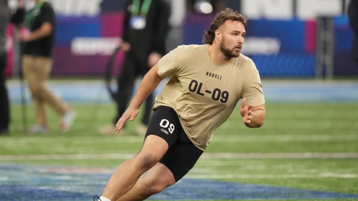 Mar 3, 2024; Indianapolis, IN, USA; Wisconsin offensive lineman Tanor Bortolini (OL09) during the 2024 NFL Combine at Lucas Oil Stadium. Mandatory Credit: Kirby Lee-USA TODAY Sports Mar 3, 2024; Indianapolis, IN, USA; Wisconsin offensive lineman Tanor Bortolini (OL09) during the 2024 NFL Combine at Lucas Oil Stadium. Mandatory Credit: Kirby Lee-USA TODAY Sports