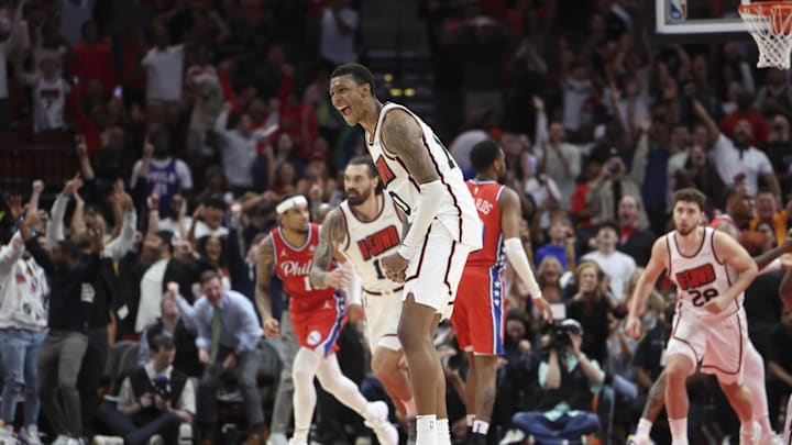 Mar 17, 2025; Houston, Texas, USA; Houston Rockets forward Jabari Smith Jr. (10) celebrates after the Rockets tie the game during the final seconds of the fourth quarter against the Philadelphia 76ers at Toyota Center. Mandatory Credit: Troy Taormina-Imagn Images