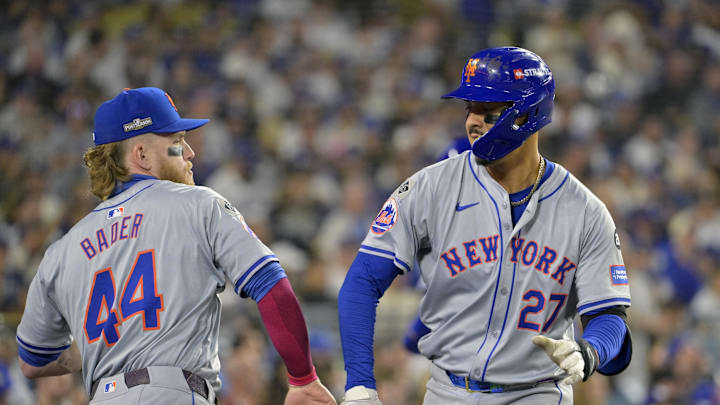 Oct 20, 2024; Los Angeles, California, USA; New York Mets third baseman Mark Vientos (27) celebrates with outfielder Harrison Bader (44) after hitting a two run home run in the fourth inning against the Los Angeles Dodgers during game six of the NLCS for the 2024 MLB playoffs at Dodger Stadium. Mandatory Credit: Jayne Kamin-Oncea-Imagn Images