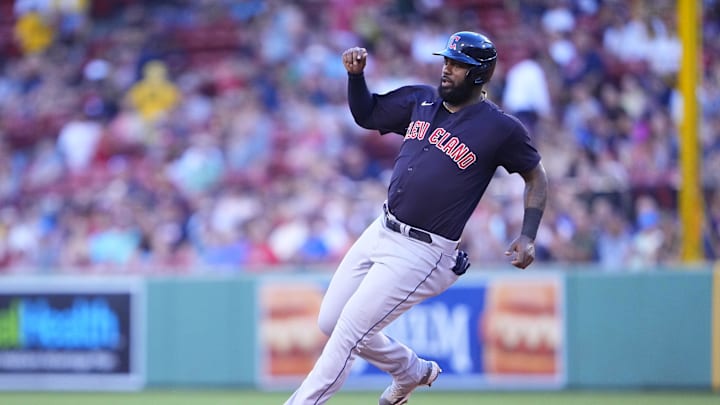 Cleveland Guardians designated hitter Franmil Reyes (32) advances to second base on Cleveland Guardians second baseman Andres Gimenez (0) (not pictured) single against the Boston Red Sox during the second inning at Fenway Park in 2022.