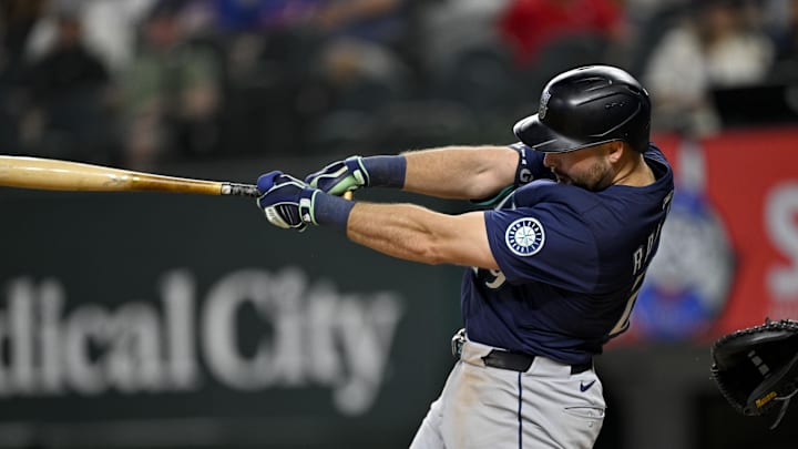 Seattle Seattle Mariners catcher Cal Raleigh (29) bats during the game between the Texas Rangers and the Seattle Mariners at Globe Life Field on June 28. 